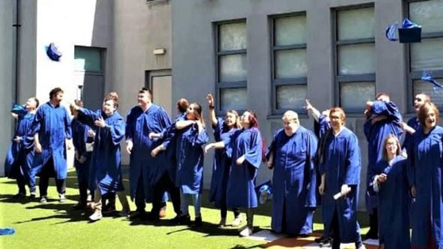 Students graduating from Scoil Chormaic